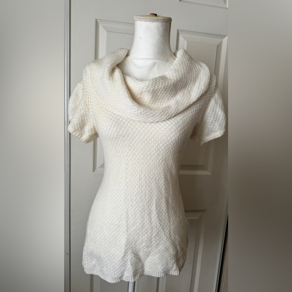 Eggshell white knit turtle neck sweater, found in a shop in Florence